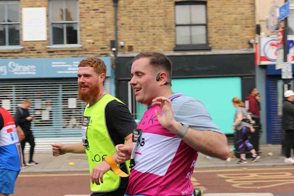 From learning to run to racing a marathon - blind runner and his guide achieve the dream